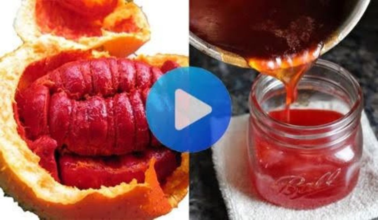 Split image. On the left, an orange-colored fruit is opened, revealing a bright red, segmented pulp. On the right, a thick, reddish liquid is being poured into a glass jar, resembling honey or oil. The scene suggests the extraction of a natural product